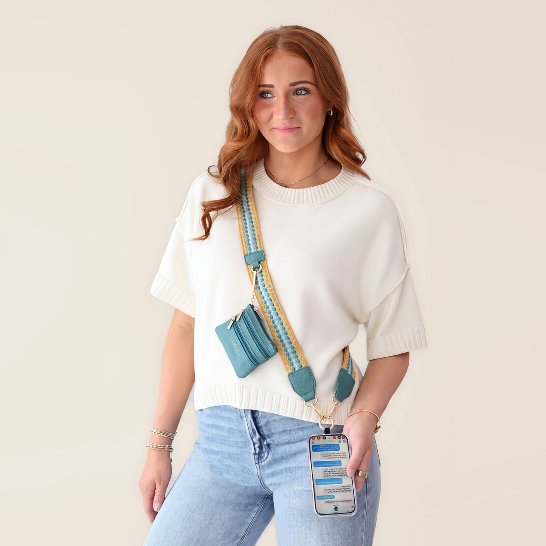 Mustard/Aqua Clip & Go phone strap with zipper pouch, wristlet, and phone holder