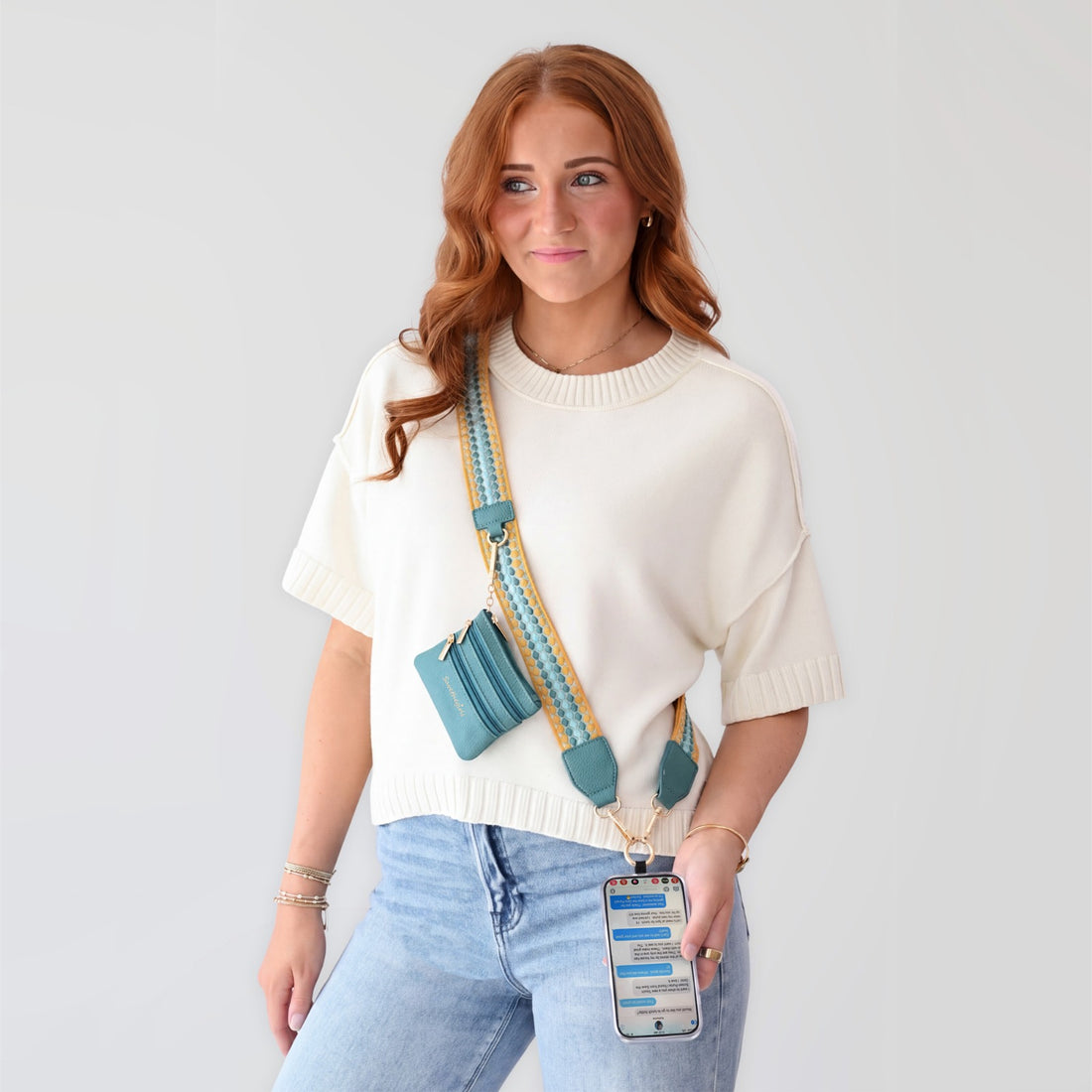 Mustard/Aqua Clip & Go phone strap with zipper pouch, wristlet, and phone holder