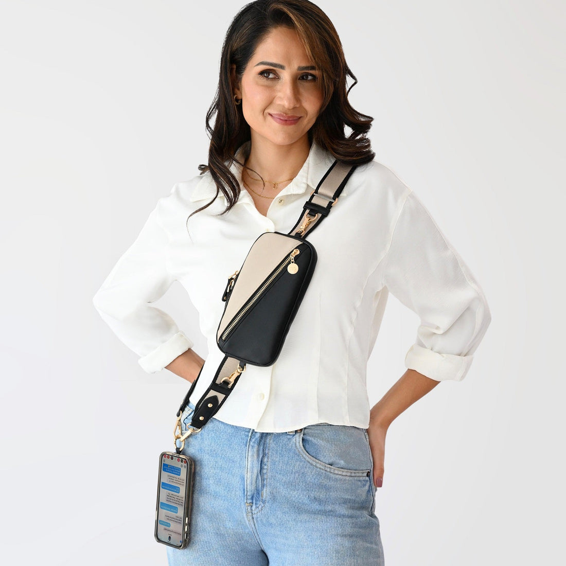 Clip & Go crossbody phone pouch with adjustable strap and removable card holder