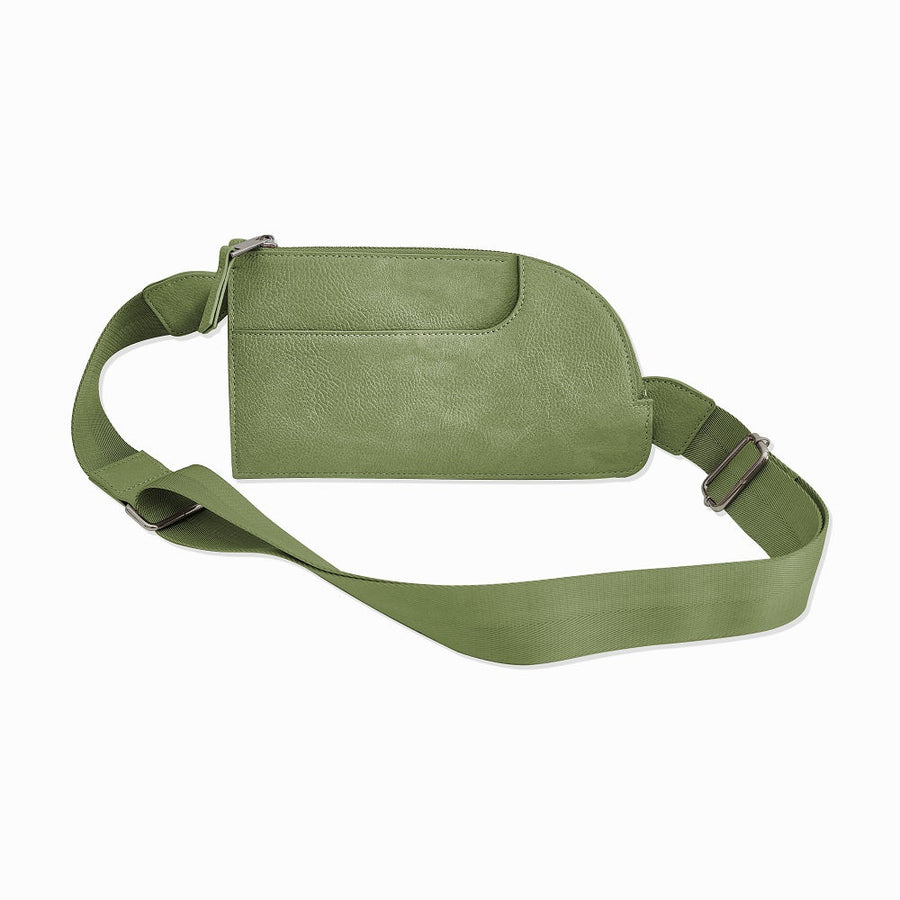 Green Sling bag that can be worn as a crossbody or fanny pack. 